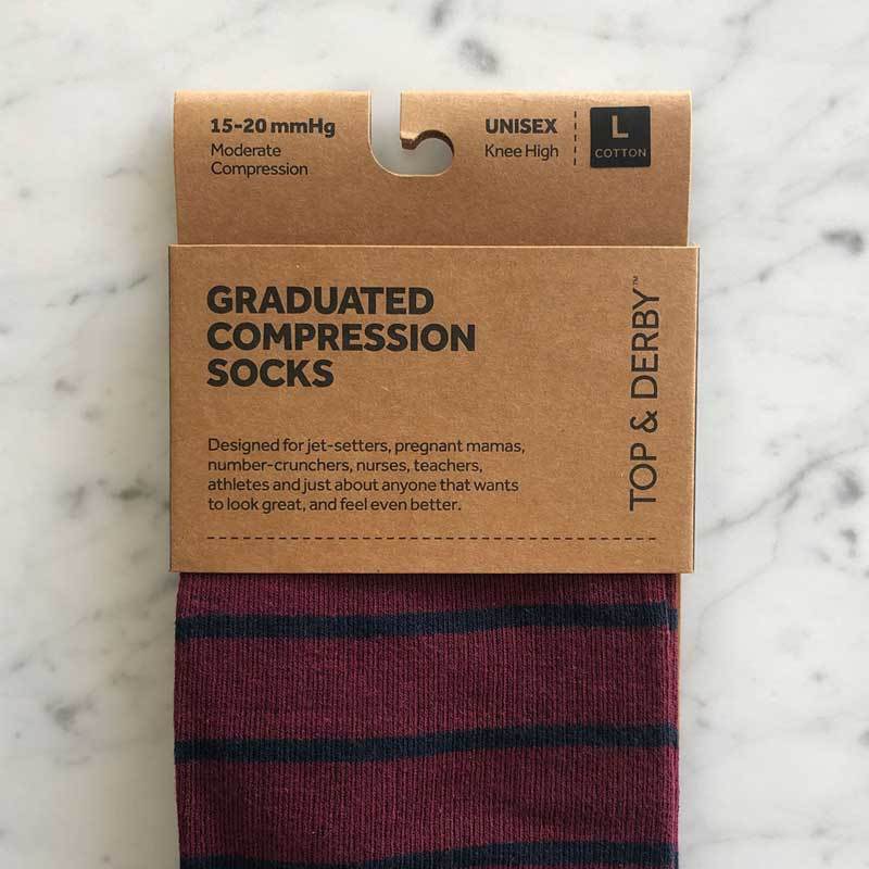 Burgundy compression sock with navy pin stripe and grey band with packaging